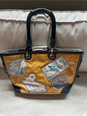 Brighton Fashionista “ first class” world, travel tote.